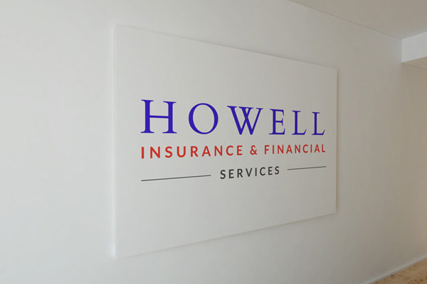 Howell Insurance & Financial Services logo printed on the wall